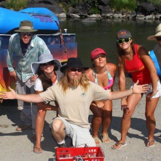 a group of people standing on a boat