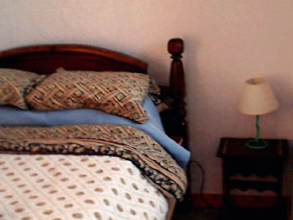 a double bed in a room