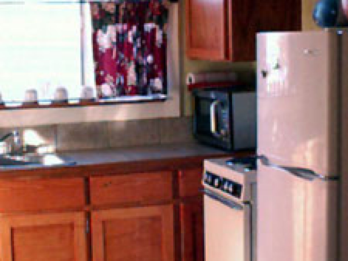 a stainless steel refrigerator in a kitchen