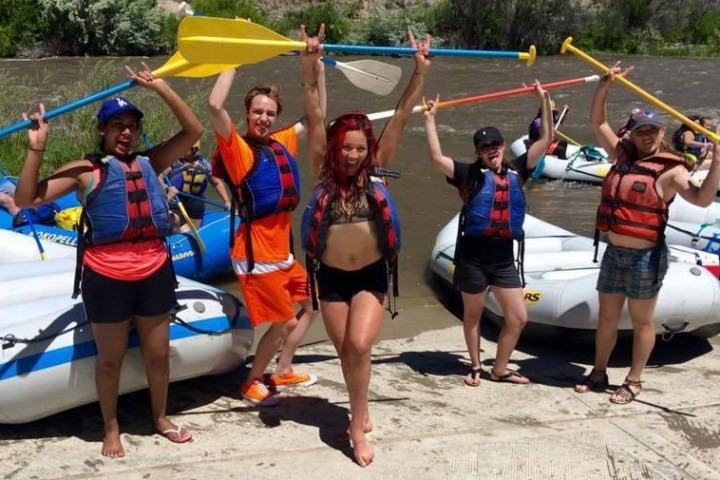 a group of people on a beach