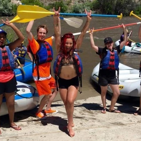 a group of people on a beach