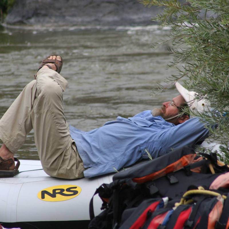 a man sitting on a boat